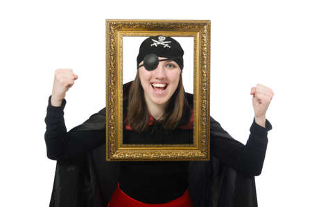 Female pirate in black coat holding photo frame isolated on whiteの写真素材