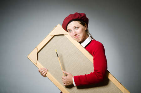 Funny artist working in the studioの写真素材