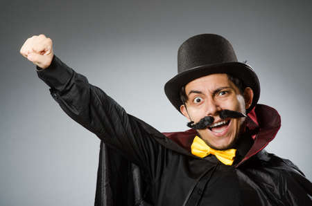 Funny magician man wearing tophatの写真素材