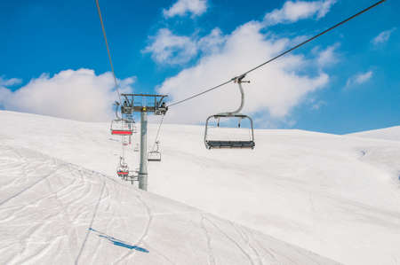 Ski lifts durings bright winter dayの写真素材