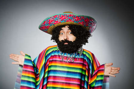 Person wearing sombrero hat in funny conceptの写真素材