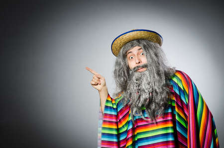 Person wearing sombrero hat in funny conceptの写真素材