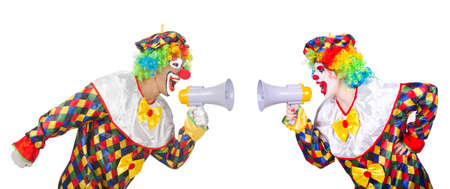 Two clowns with loudspeakers isolated on whiteの写真素材