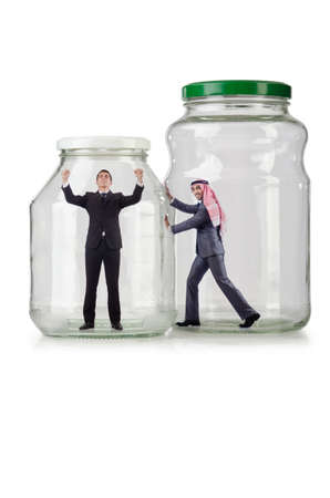 People trapped in the glass jarの写真素材