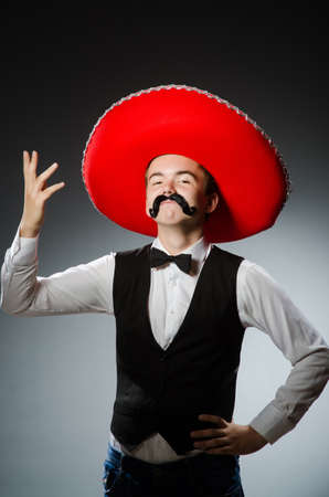 Person wearing sombrero hat in funny conceptの写真素材