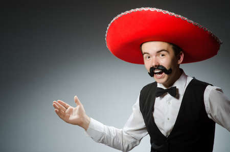 Person wearing sombrero hat in funny conceptの写真素材