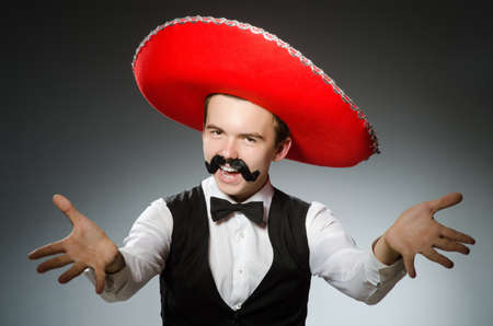 Person wearing sombrero hat in funny conceptの写真素材