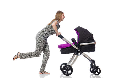Happy mom with her baby in pram