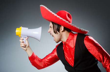Person wearing sombrero hat in funny conceptの写真素材