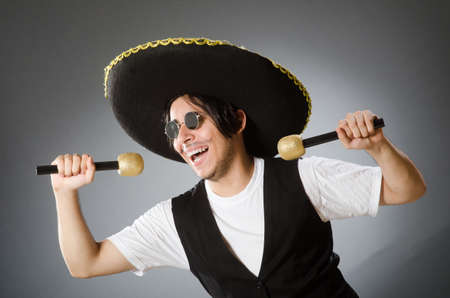 Person wearing sombrero hat in funny conceptの写真素材