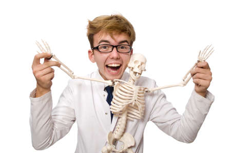 Funny doctor with skeleton isolated on whiteの写真素材
