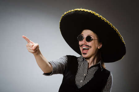Person wearing sombrero hat in funny conceptの写真素材