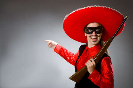 Person wearing sombrero hat in funny conceptの写真素材