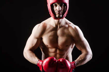Muscular man in boxing conceptの写真素材