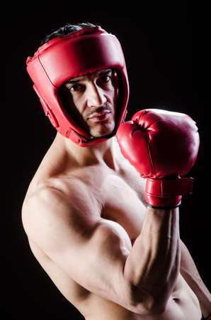 Muscular man in boxing conceptの写真素材