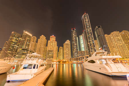 Dubai - AUGUST 9, 2014: Dubai Marina district on August 9 in UAE. Dubai is fastly developing city in Middle Eastのeditorial素材