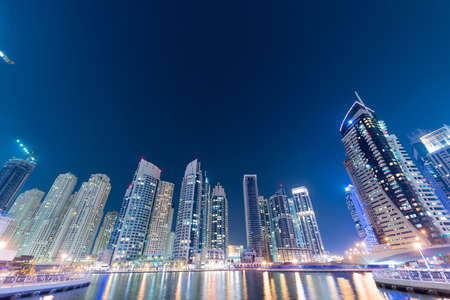 Dubai - JANUARY 10, 2015: Marina district on January 10 in UAE, Dubai. Marina district is popular residential area in Dubaiのeditorial素材