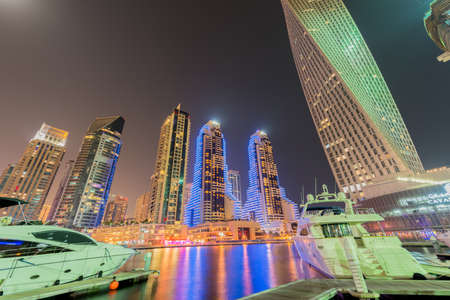 Dubai - JANUARY 10, 2015: Marina district on January 10 in UAE, Dubai. Marina district is popular residential area in Dubaiのeditorial素材