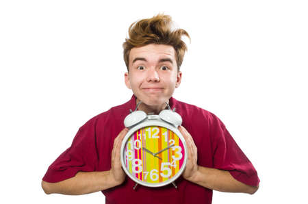 Student holding alarm clock isolated on whiteの写真素材