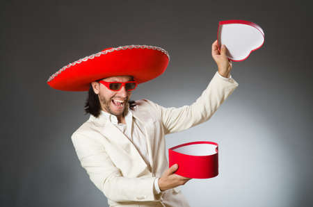 Person wearing sombrero hat in funny conceptの写真素材