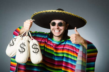 Mexican man with money sacksの写真素材