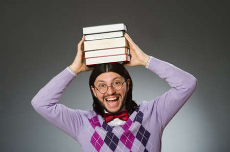 Young student with book in learning concept