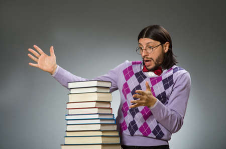 Young student with book in learning concept