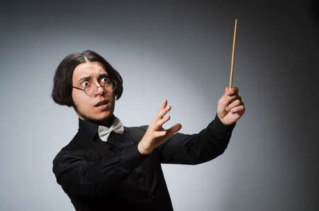 Funny conductor in musical conceptの写真素材