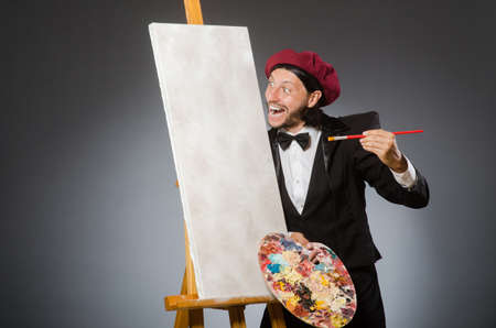 Funny artist working in the studioの写真素材