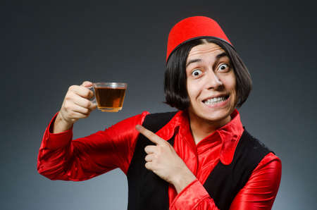 Man wearing red fez hatの写真素材