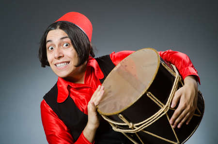 Man wearing red fez hat