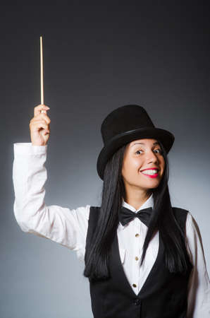 Woman magician in funny conceptの写真素材