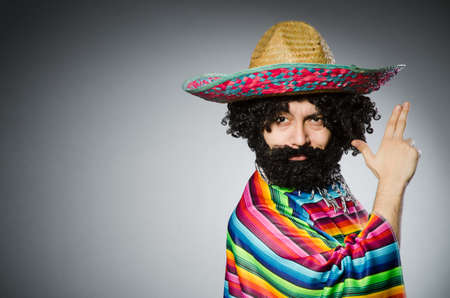 Person wearing sombrero hat in funny conceptの写真素材