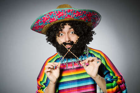 Person wearing sombrero hat in funny conceptの写真素材