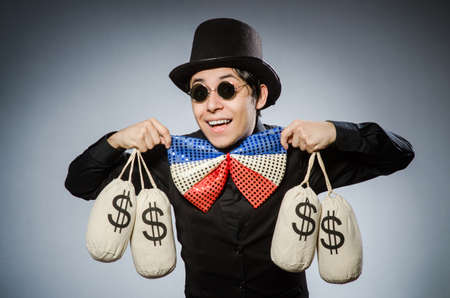 Funny man with money dollar sacksの写真素材