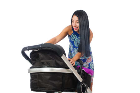 Happy mom with her baby in pramの写真素材