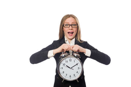 Pretty office employee with alarm clock isolated on whiteの写真素材