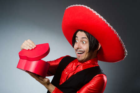 Person wearing sombrero hat in funny conceptの写真素材