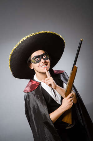 Person wearing sombrero hat in funny conceptの写真素材