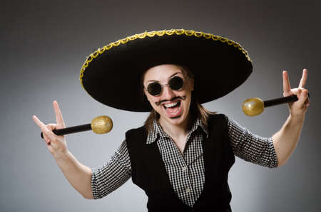 Person wearing sombrero hat in funny conceptの写真素材