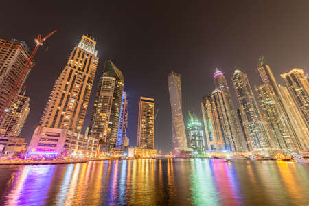 Dubai - JANUARY 10, 2015: Marina district on January 10 in UAE, Dubai. Marina district is popular residential area in Dubaiのeditorial素材