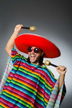 Person wearing sombrero hat in funny conceptの写真素材