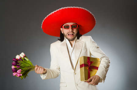 Person wearing sombrero hat in funny conceptの写真素材