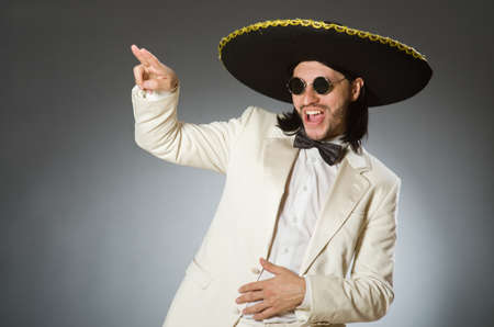 Person wearing sombrero hat in funny conceptの写真素材