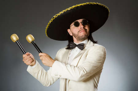 Person wearing sombrero hat in funny concept