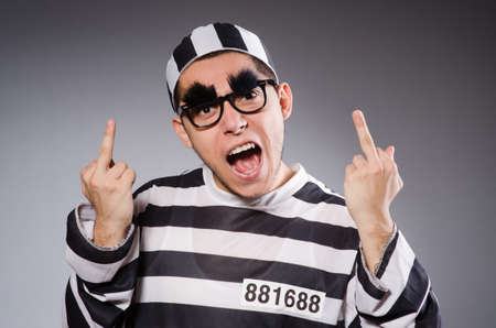 Young prisoner against grayの写真素材