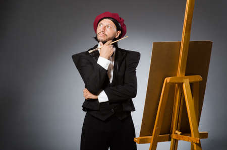 Funny artist working in the studioの写真素材