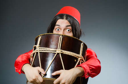 Man wearing red fez hatの写真素材