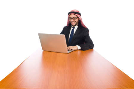 Arab businessman with computer on whiteの写真素材