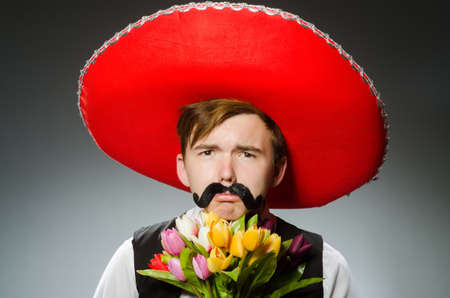 Person wearing sombrero hat in funny conceptの写真素材